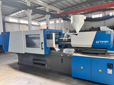 spoon injection molding machine